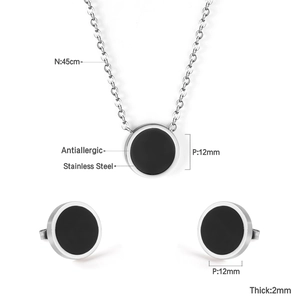 Macro view of 12mm black shell necklace and stud earrings set with size measurements