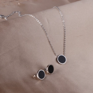 Modern black shell jewelry set with round necklace and stud earrings in stainless steel