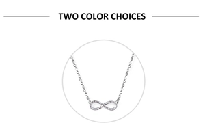 Detailed view of infinity pendant with sparkling crystals on a thin silver chain