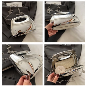 Detailed views of a silver mirror acrylic evening bag with metal chain strap and interior