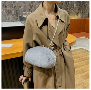 Detailed plush grey faux fur bag with pearl strap and metal clasp closure