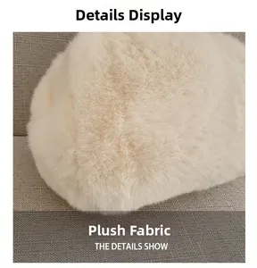 Macro shot of fluffy white plush fabric texture on shell shaped crossbody bag