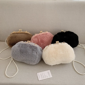 Faux fur shell crossbody bag with pearl chain strap in five different soft colors
