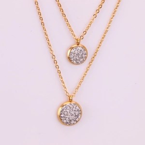 Set collana doppia a strati dorata con pendenti circolari in strass e acciaio inossidabile