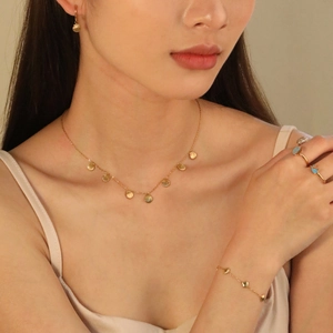 Gold ocean shell jewelry set with necklace, bracelet, earrings and blue enamel ring