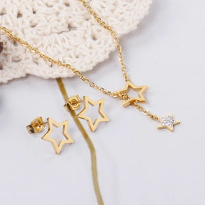 Parure étoile en acier inoxydable doré avec collier et boucles d'oreilles en zircon blanc