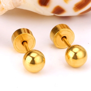 Minimalist gold titanium steel barbell stud earrings with screw back on a seashell