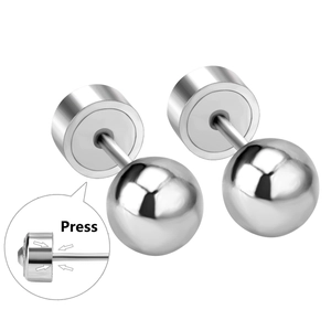 Detail of silver ball studs showing the press-on flat back closure mechanism