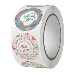 Detail of floral Thank You stickers roll featuring various garden patterns and birds