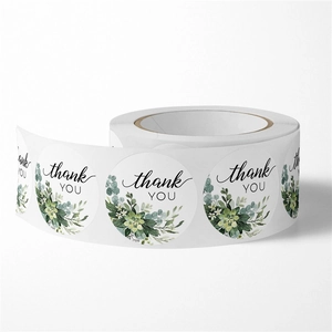 Roll of round floral thank you stickers with watercolor succulents and green leaves