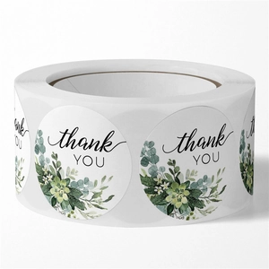 Roll of floral thank you stickers with botanical leaves for wedding gift sealing