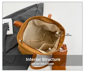 Internal structure of brown suede tote bag showing main compartment and mobile phone pocket