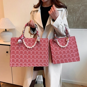 Rode bruidstas met Xi-personage jacquard en parelhandvaten voor bruiloften