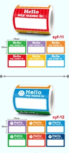 Macro view showing colorful 75x50mm self-adhesive name label stickers on a roll