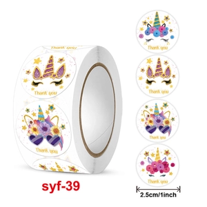 Roll of 1-inch unicorn thank you stickers featuring four colorful cartoon designs