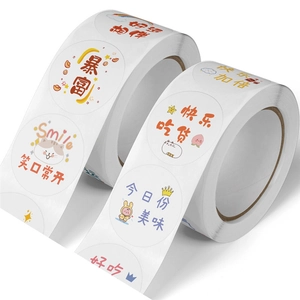 Roll of creative cartoon stickers with cute cats and motivational quotes for decoration