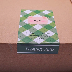 Cute bear rectangular gift seal stickers with green plaid pattern on kraft cardboard box