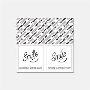 Macro view of rectangular Smile stickers with Have a Nice Day text and Thank You pattern