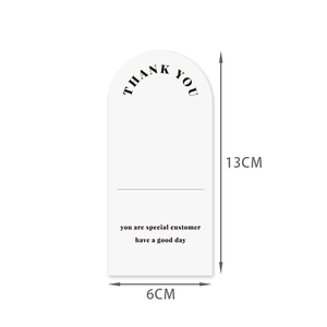 White rectangular adhesive stickers with Thank You message and dimensions 13x6cm for packaging