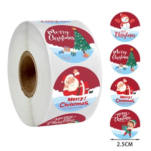 Detail of 2.5cm Christmas stickers roll with cartoon Santa and reindeer designs