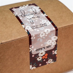 Floral Thank You stickers on kraft box with text Open Me and You Have Been Expecting Me