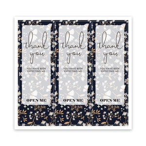 Detail of floral rectangular thank you stickers with navy blue finish and elegant script