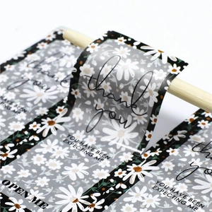 Floral Thank You stickers with daisy patterns for gift box sealing and packaging
