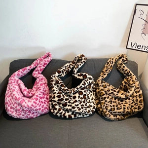 Plush leopard print hobo shoulder bags in pink, black, and tan faux fur for autumn winter