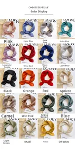 Detailed color display of twenty solid silk square scarves showing smooth fabric texture