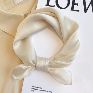 Elegant cream silk square scarf tied on a shirt with a premium satin finish