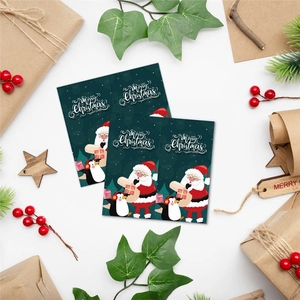 50pcs Merry Christmas rectangle stickers with Santa and penguin illustrations on gift boxes
