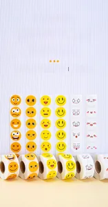 Detailed view of colorful waterproof emoji reward sticker rolls for kids decoration