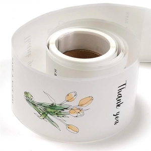 Close-up of semi-transparent tulip floral stickers for gift boxes and packaging