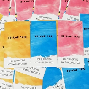 Colorful watercolor thank you cards for small business in blue, pink, and yellow hues
