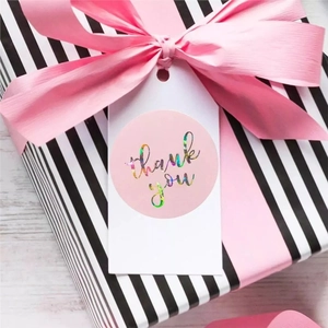 Pink holographic thank you stickers with rainbow lettering for gift packaging seals