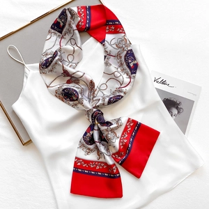 Classic red, white, and blue vintage carriage print silk scarf styled on a white top