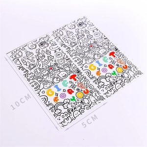 Detail showing 10x5cm black and white graffiti stickers with colorful GIFT text