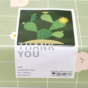 Rectangular cactus Thank You stickers for small business packaging on green gift box