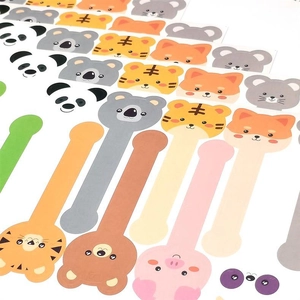 Close-up of cute cartoon animal long stickers for DIY cake box sealing and index marking