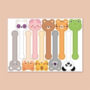 Close-up of cute cartoon animal stickers including pandas and cats for cake box sealing