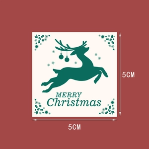 5cm square Christmas labels with green reindeer silhouette and Merry Christmas text