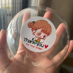 Cartoon thank you labels on clear gift balls for party packaging and decorations