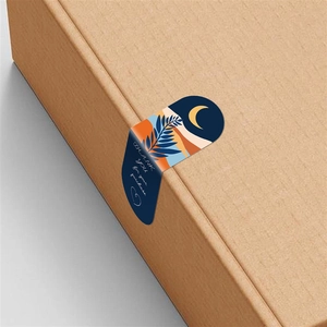 Artistic rectangle thank you stickers on brown box with abstract moon and leaf design