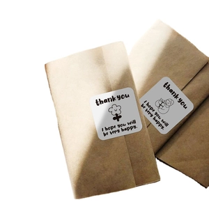 Square thank you stickers for packaging with minimalist floral and hand-drawn patterns
