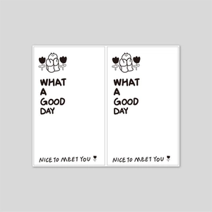 Close-up of white rectangular labels with cartoon bear and What A Good Day text