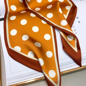 Polka dot silk scarf in ginger yellow with contrast brown border and satin finish