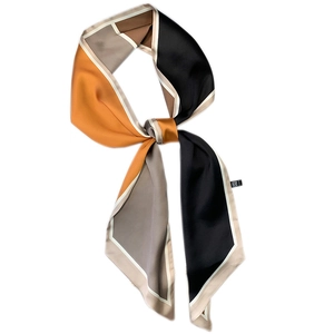 Fashionable geometric patterned skinny silk scarf in earthy tones with satin finish