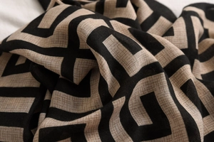 Detail shot of modern geometric pattern on breathable cotton linen blend scarf fabric