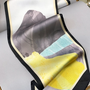 Macro shot of silk texture and abstract oil painting print on long skinny scarf