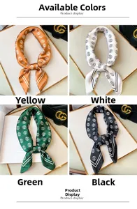 Detail view of four silk-like square scarves in yellow, white, green, and black with dots